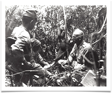 Col. Hugh Straughn is captured in 1943 as the Japanese created a "wanted list" of American Guerilla leaders considered "War Rebels."  To the Japanese they were bandits, and when captured were tortured mercilessly and beheaded.